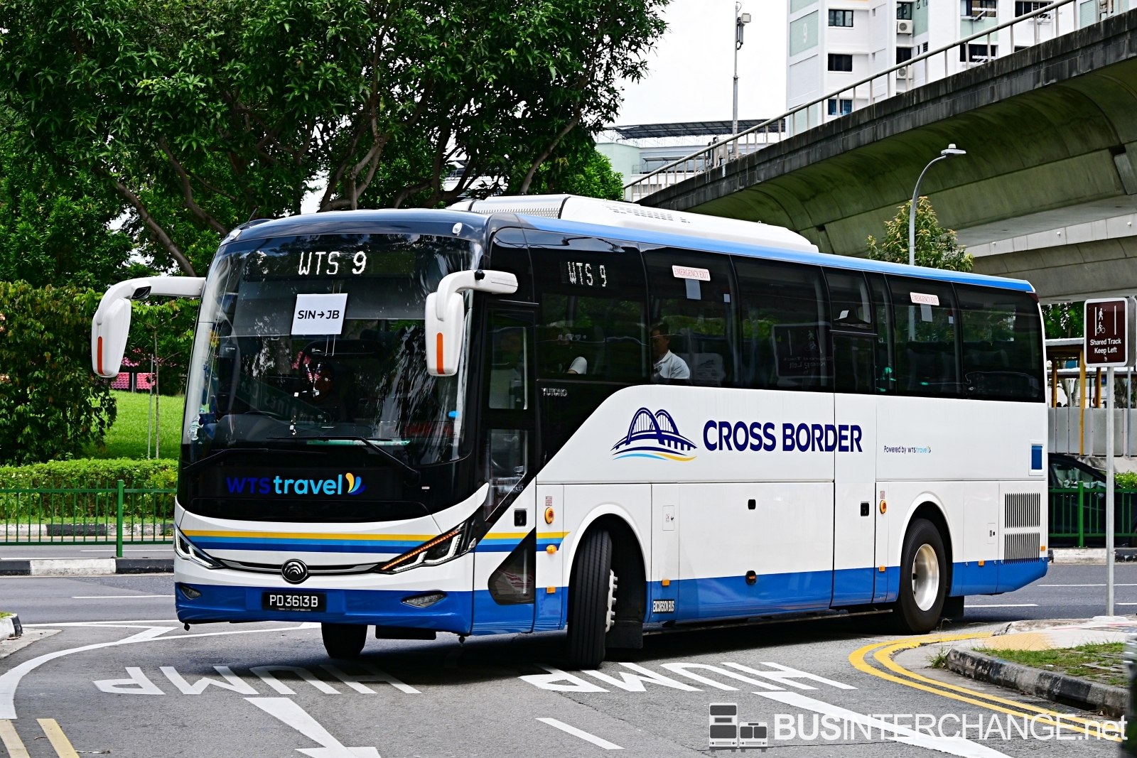 The Yutong C11 (PD3613B) is seen on WTS Travel Cross Border Bus Service WTS 9.