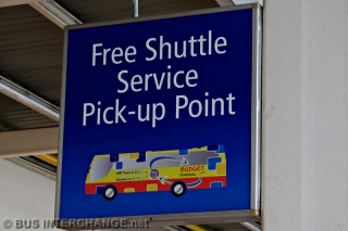 Free Shuttle Service (Old) Sign