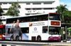 Thumbnail: SBS9802U — Historical archive of a Volvo B10TL Super Olympian double-deck bus, pictured carrying a Esso advertisement, operating on service 8 under SBS Transit. Photographed in July 2011, buses of this model type have since been completely retired from passenger service.