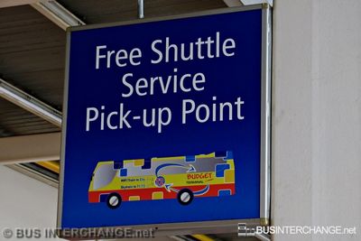 Free Shuttle Service (Old) Sign - Woodlands Transport
